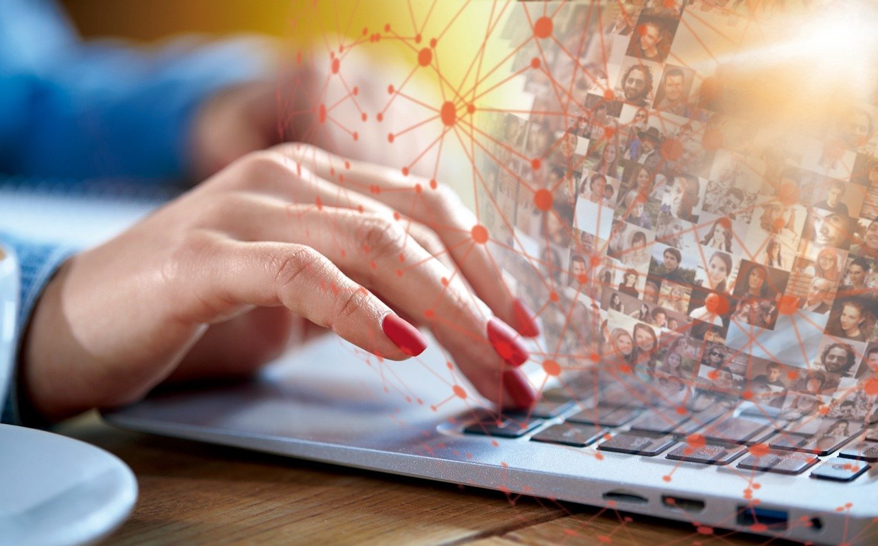 A Woman's Hand Working on Laptop for Staffing and Recruitment